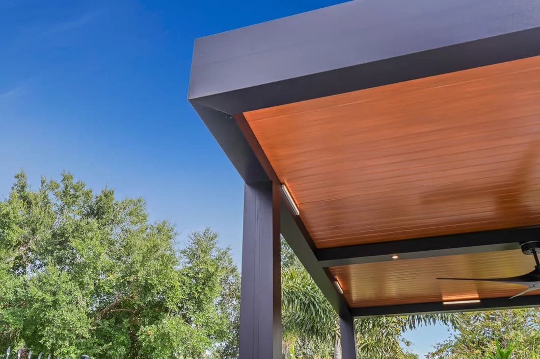 Azenco Outdoor R-SHADE patio cover with wood-grain insulated panels
